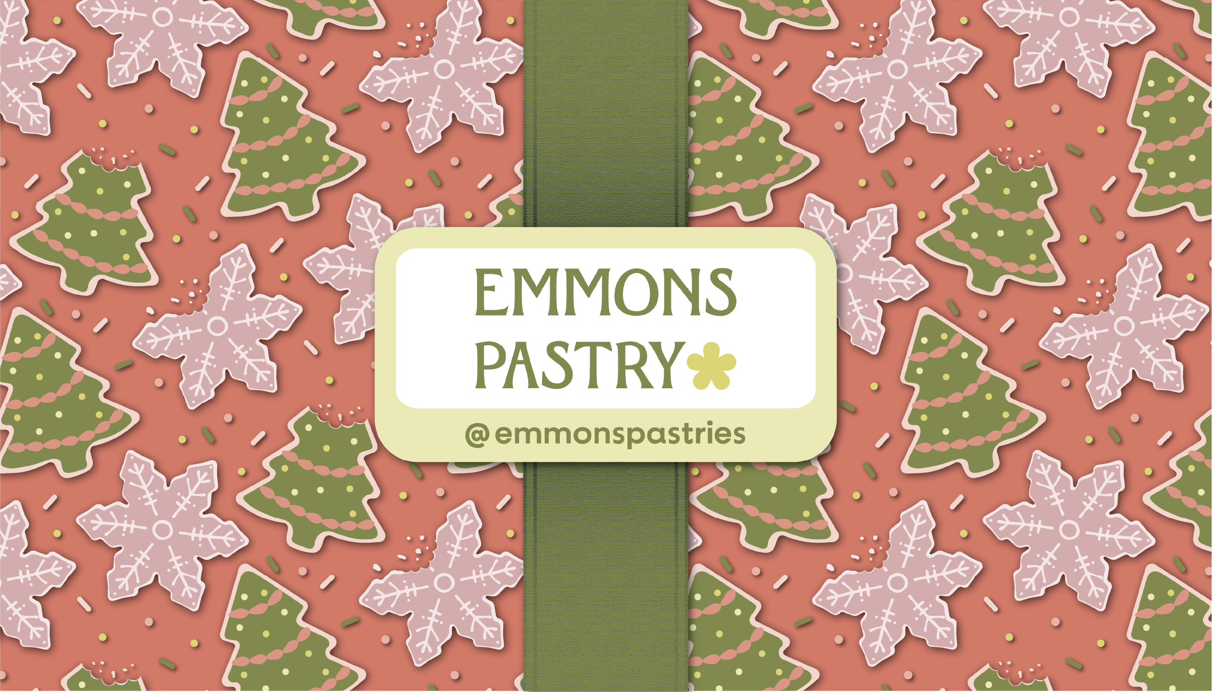 Green Christmas tree and pink snowflake cookies pattern with a label reading Emmons Pastry and @emmonspastries on a green ribbon.