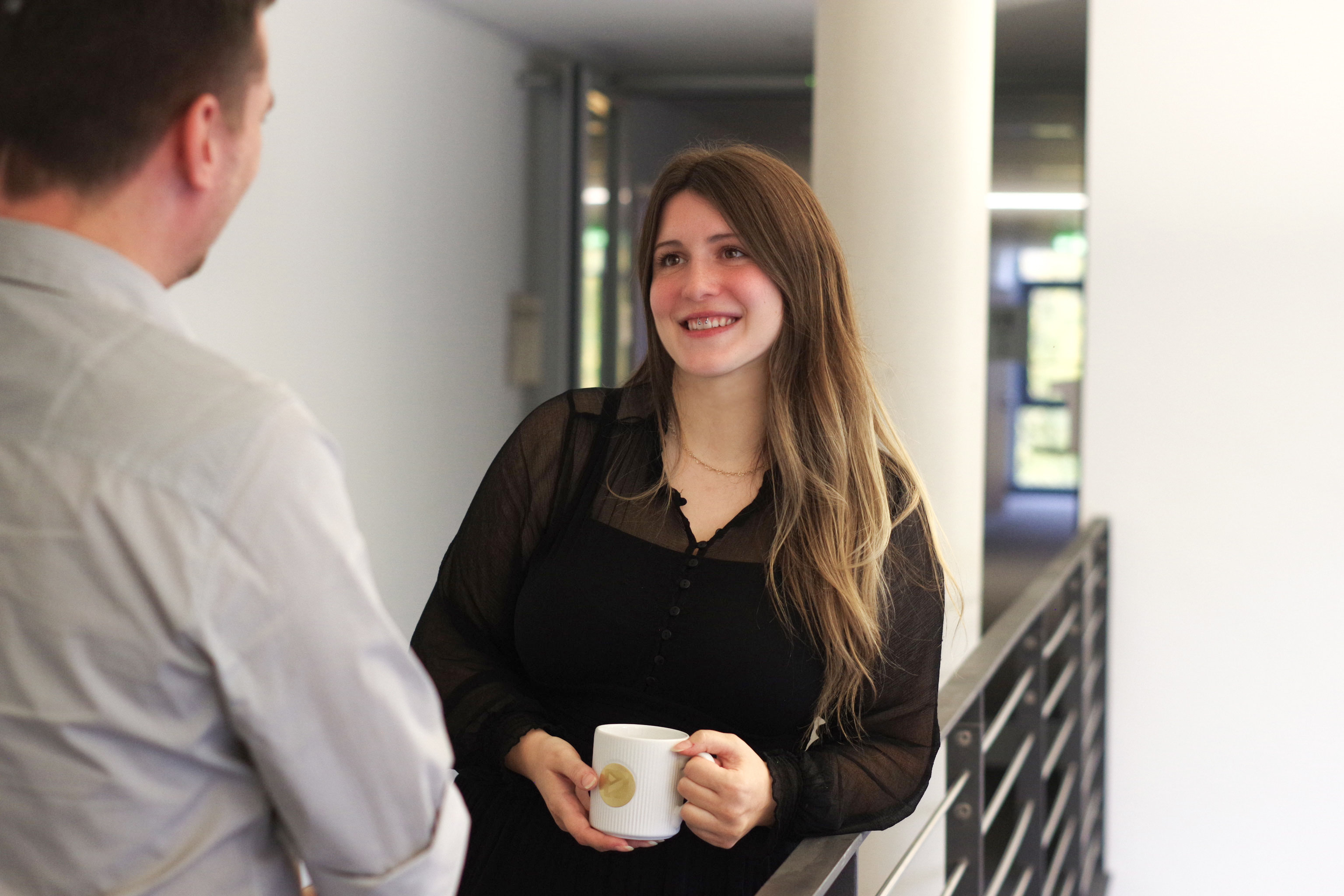 Milena standing in front of Robin