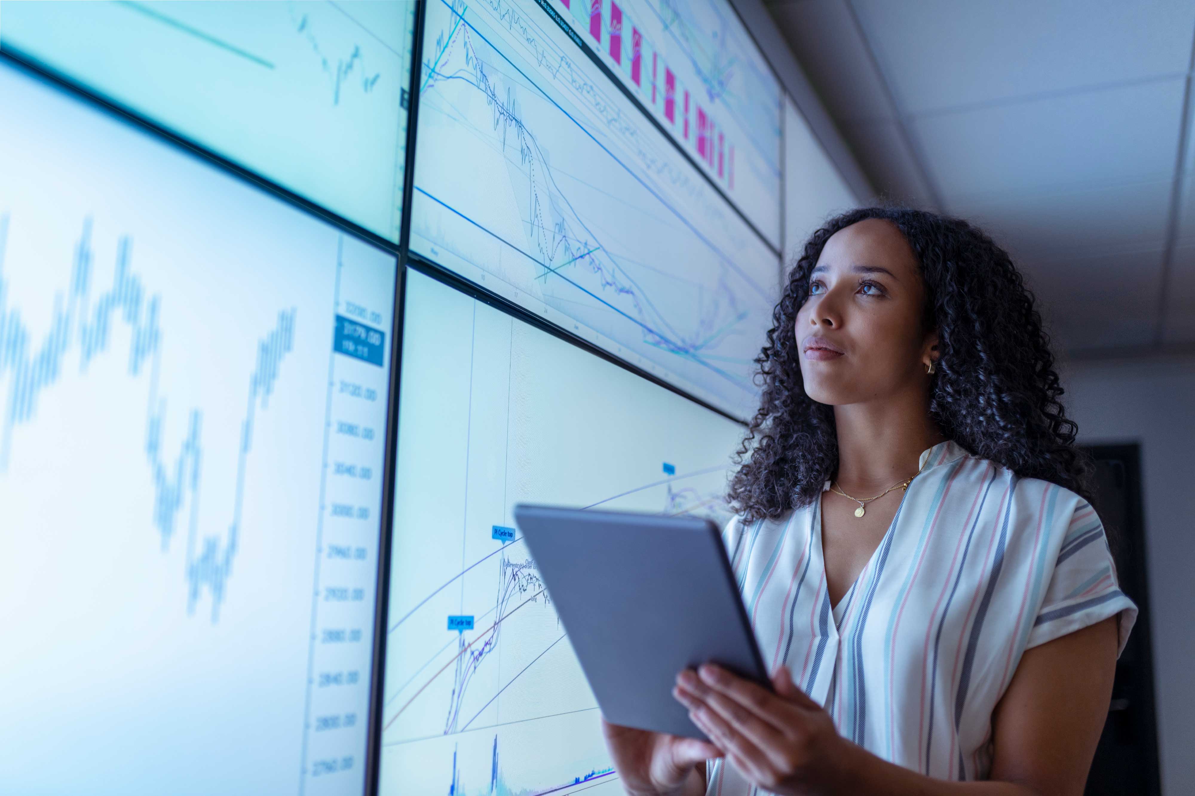Woman standing in front of a dashboard