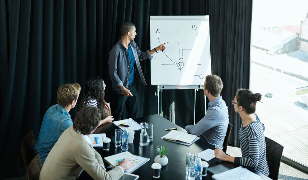 people who discuss in a meeting room