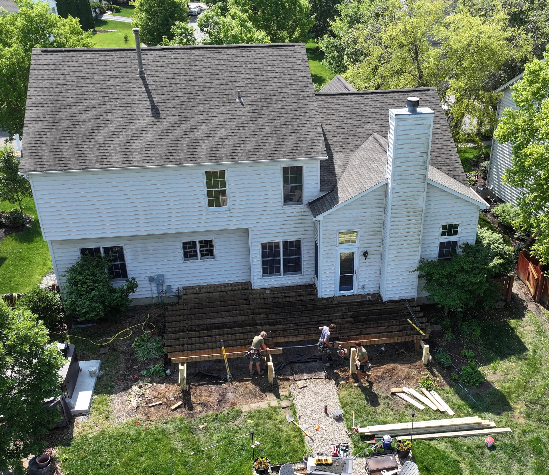 Dutchmen Decks crew building the frame for a custom backyard deck in Powell, Ohio.