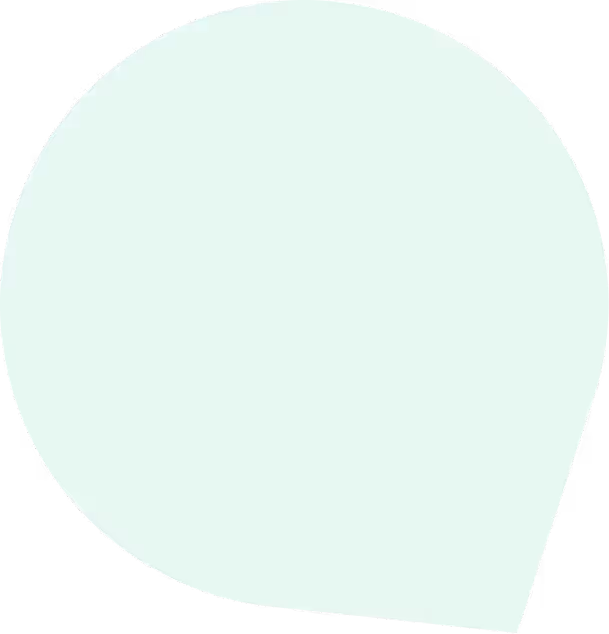 Light mint green speech bubble with a rounded top and a pointed tail at the bottom right.
