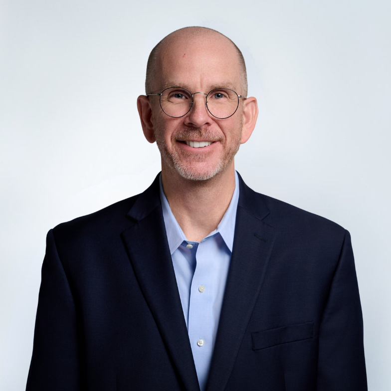 A portrait of Eric Schutt, Chief of Staff & Vice President Government Affairs.