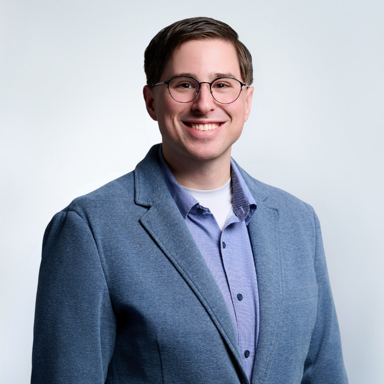 A portrait of Eli Moll, Vice President of Research & Development.