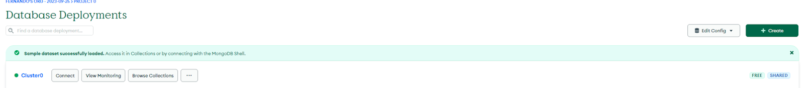 MongoDB Atlas displays a message confirming that the sample dataset was successfully loaded.