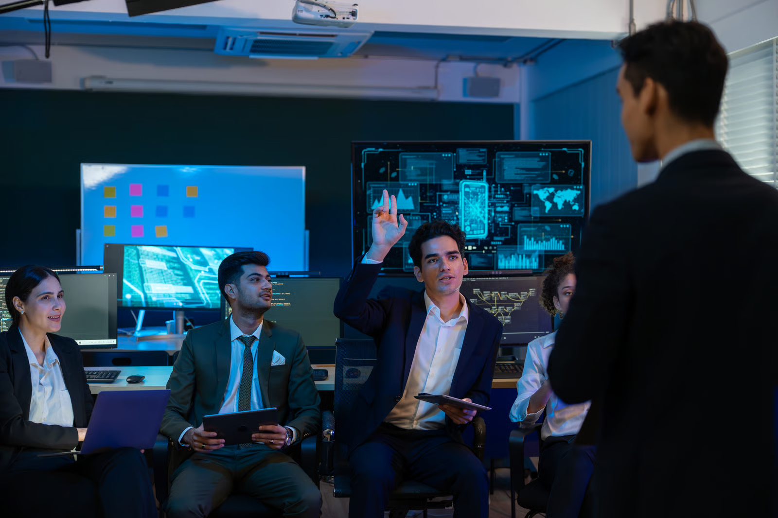 Enterprise team reviews AI system activity in a security operations center, illustrating monitoring and governance for AI agents.