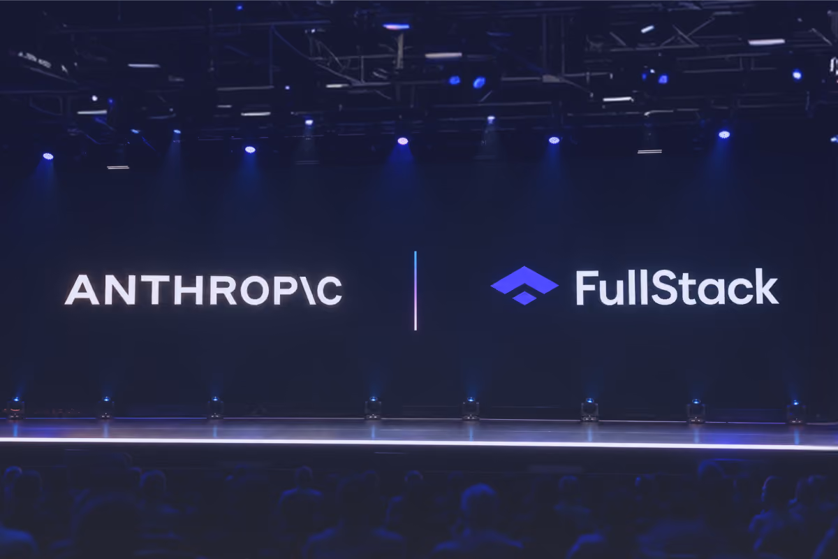 Anthropic and FullStack logos displayed together on a stage, representing FullStack’s Anthropic Certified status and Claude enterprise AI expertise.