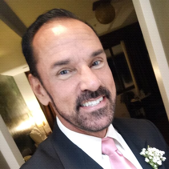 headshot of Michael Ray Johnson, international business exec.