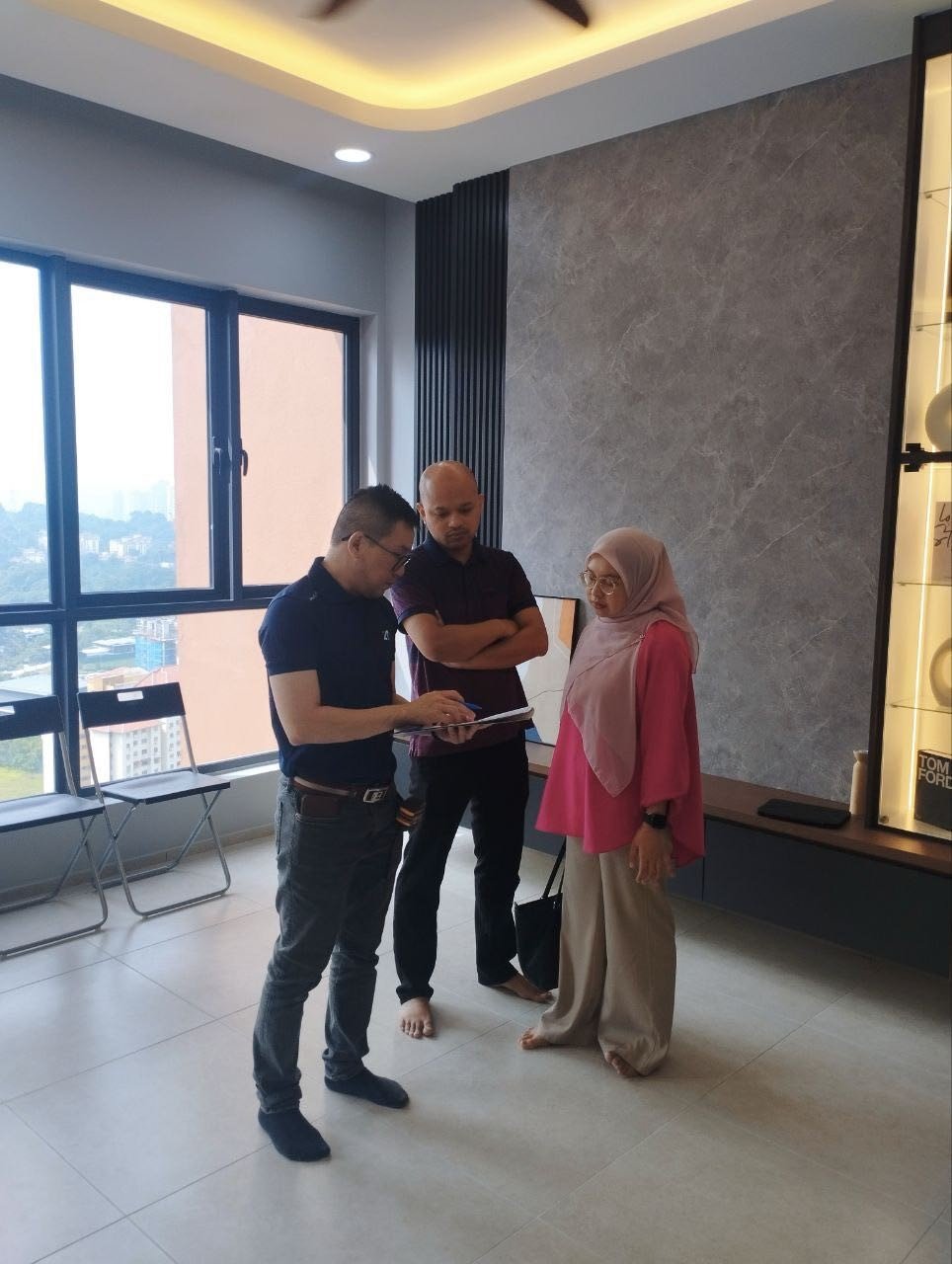 Designer chatting with guests in the showroom