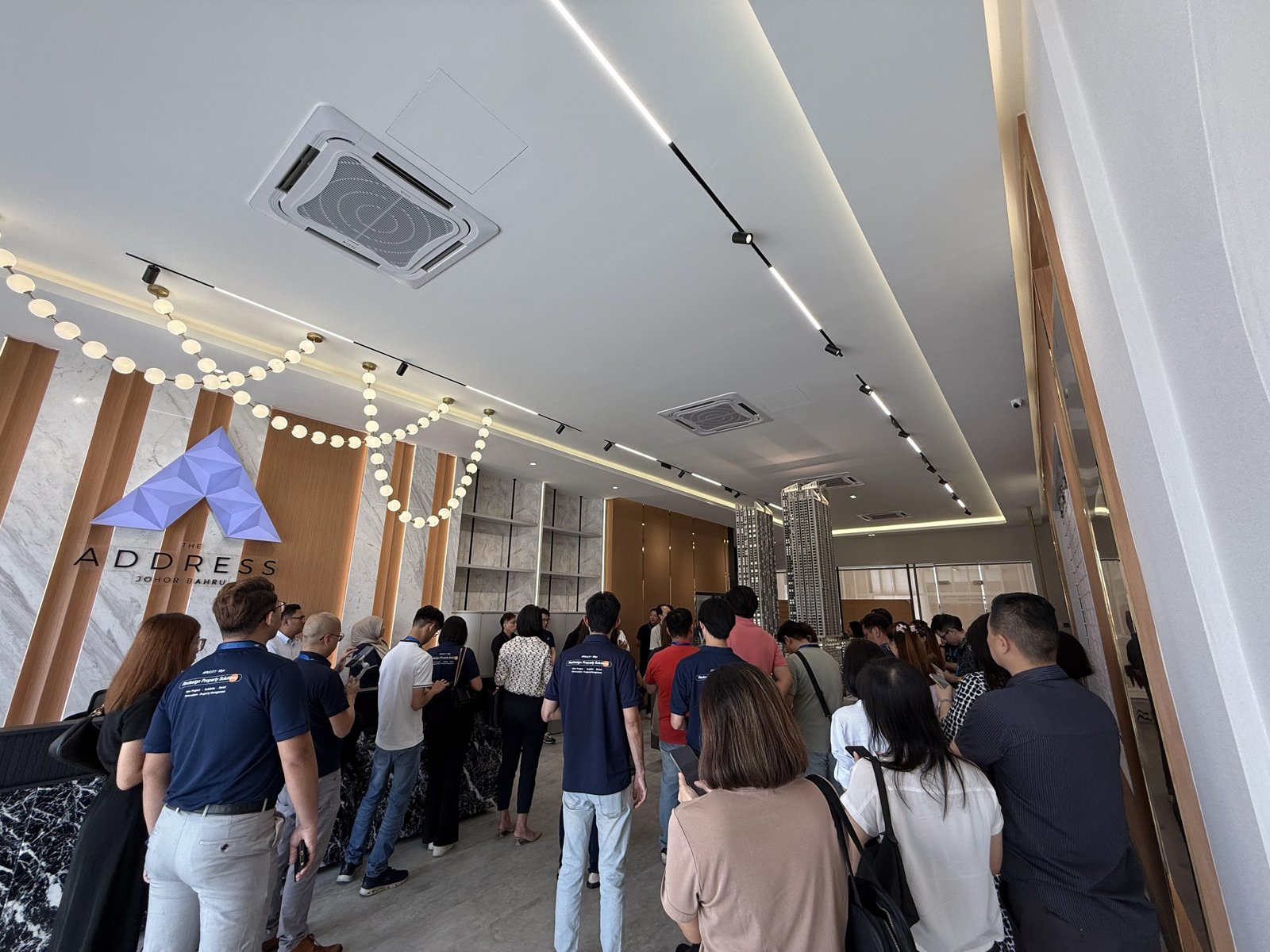 Briefing guests gathered in the sales gallery