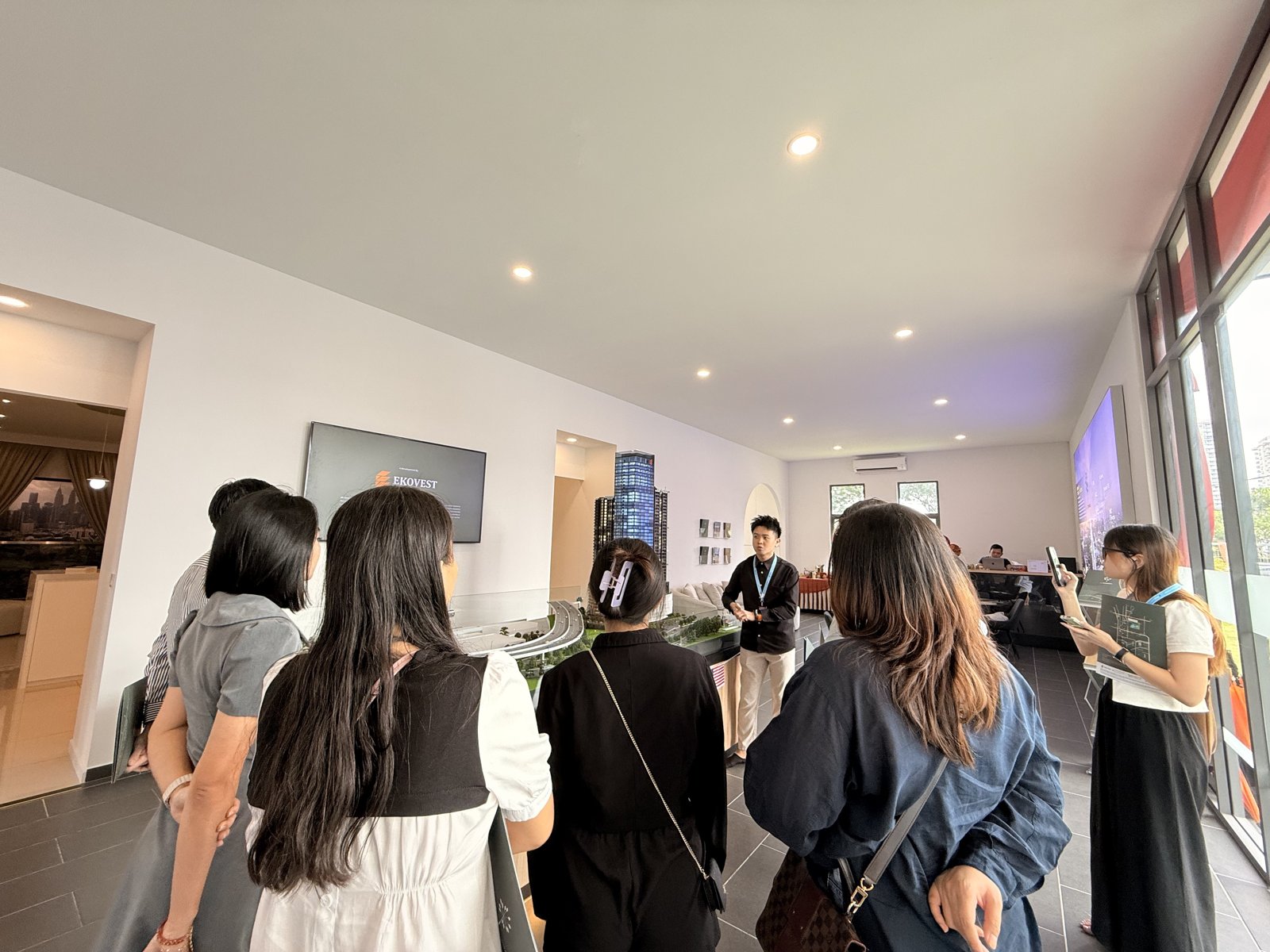 Team touring the sales gallery