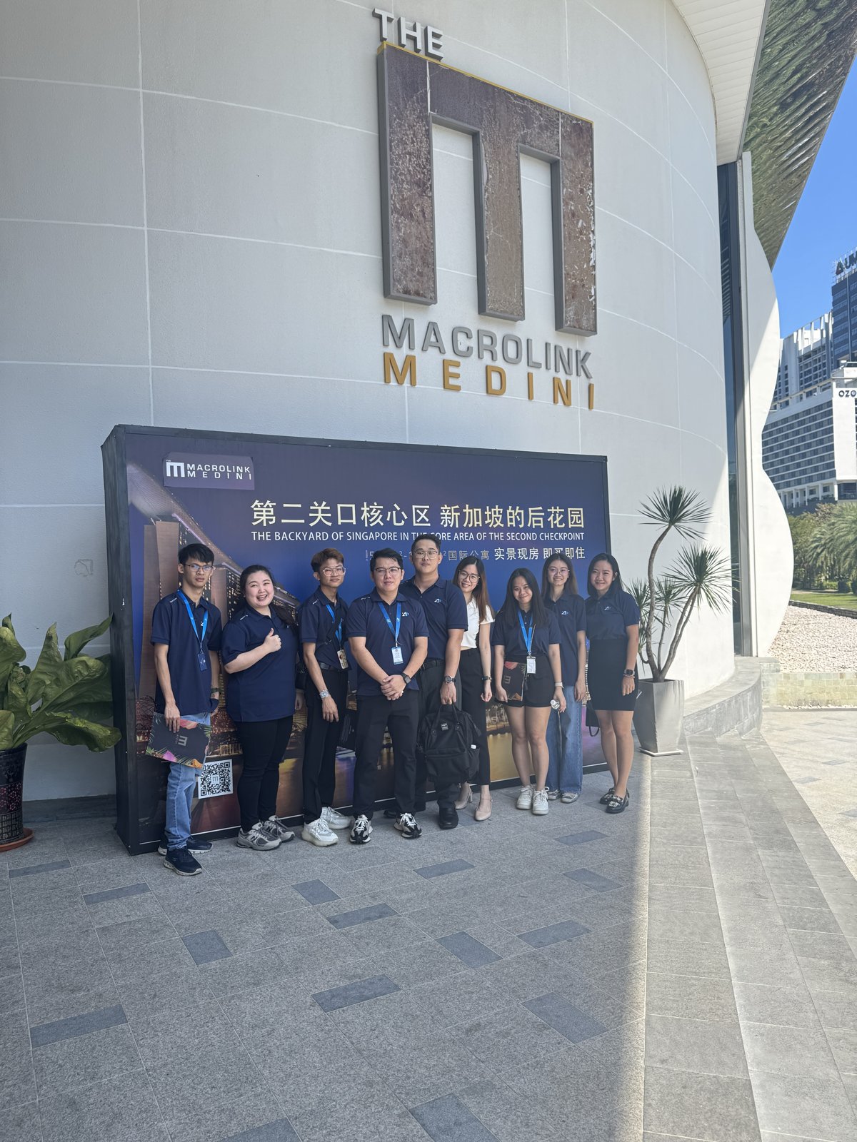 Apricity team at the Macrolink Medini entrance