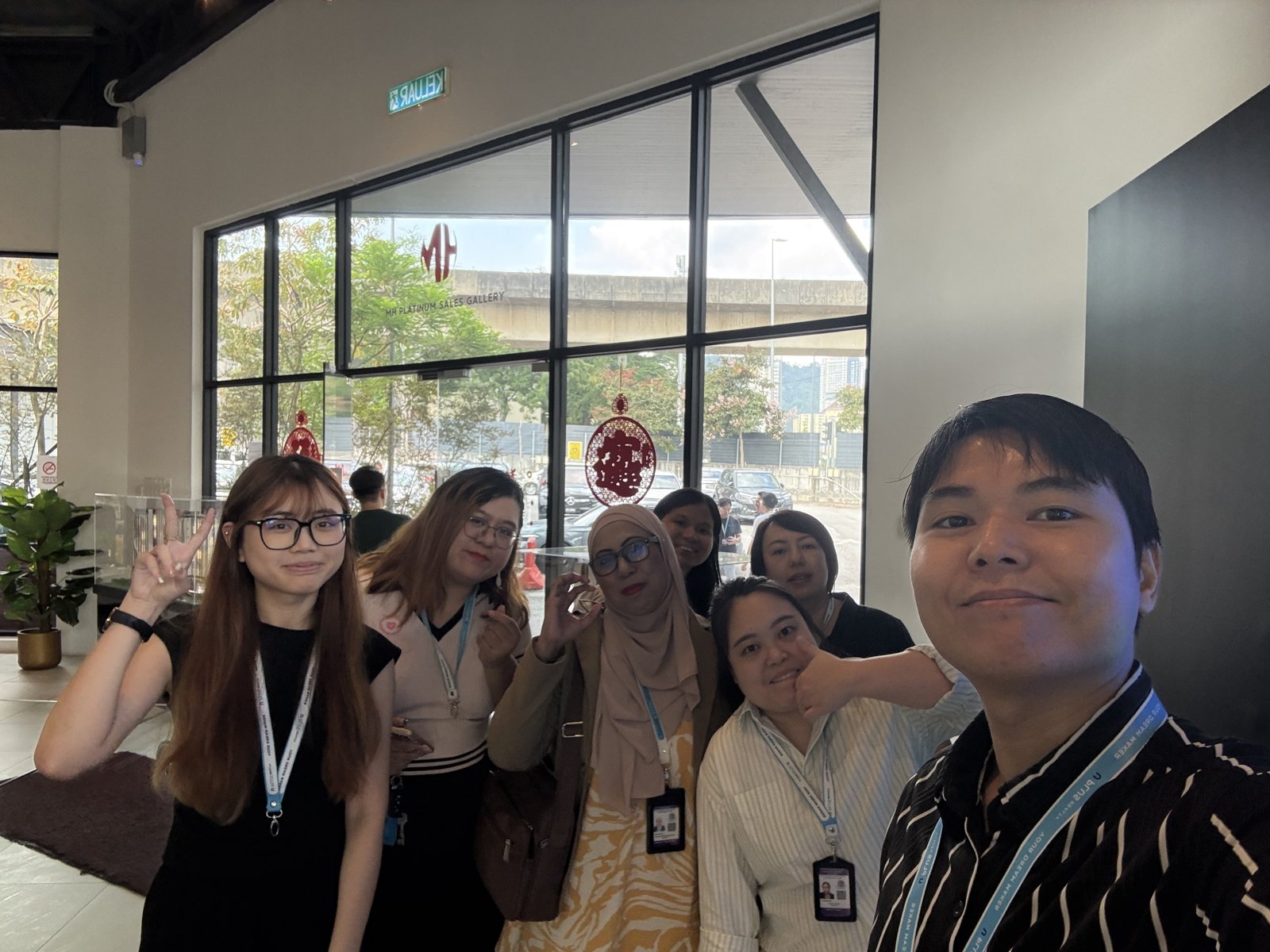 Apricity team selfie at the sales gallery