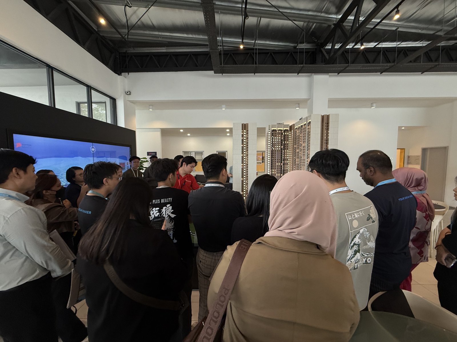 Team touring the sales gallery