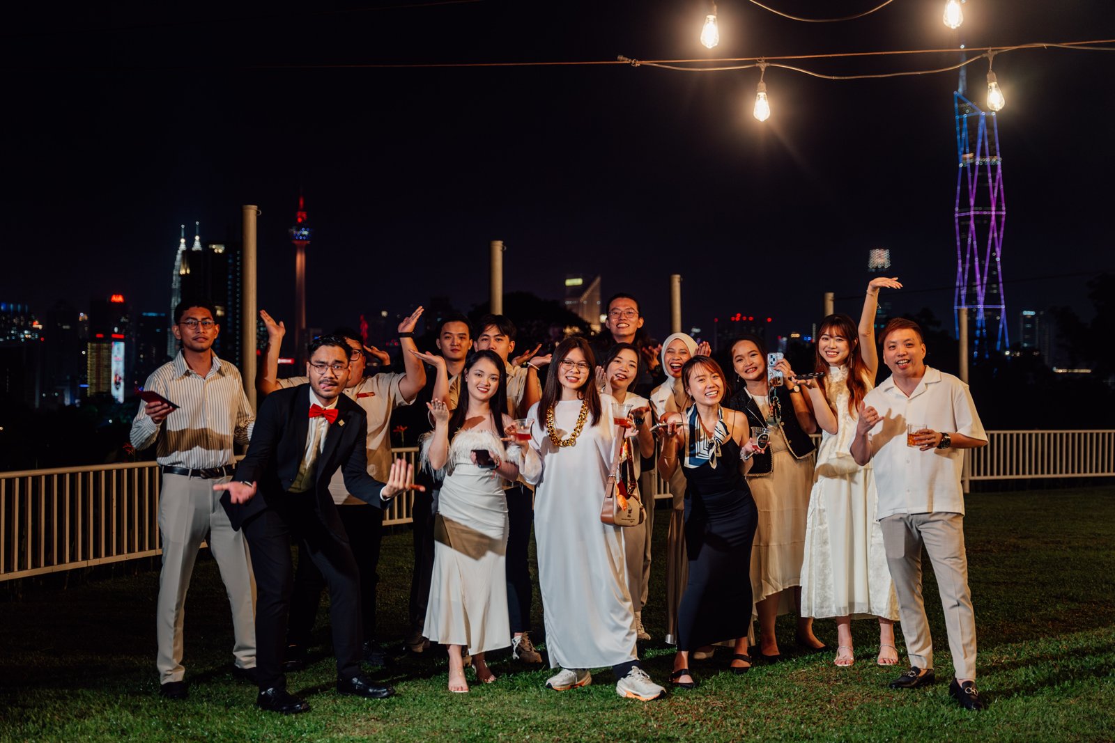 Group photo on the lawn at night