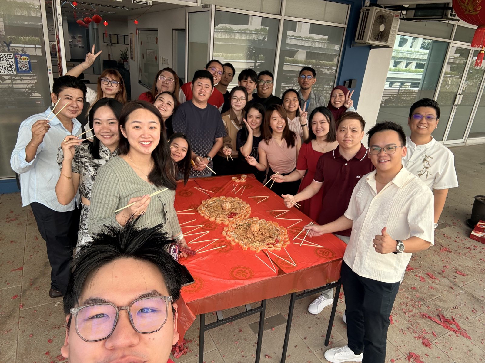 Group selfie during the yee sang toss