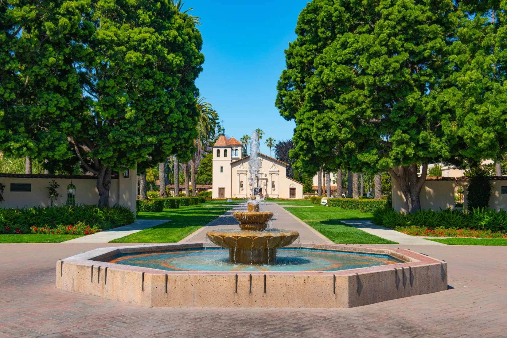 the historic Mission Santa Clara de Asís and a tiered fountain on the Santa Clara University campus