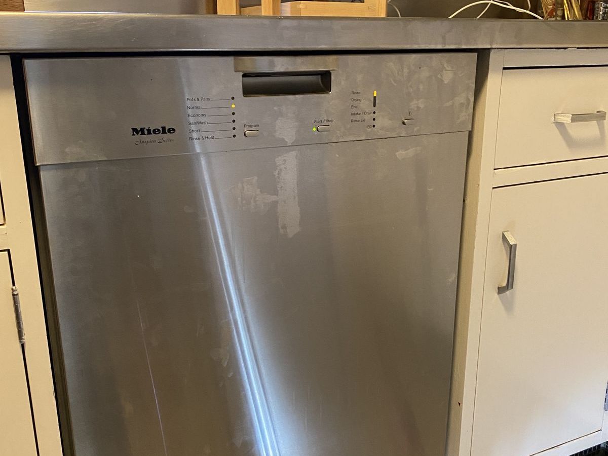 Stainless steel Miele Inspira dishwasher in a NYC kitchen