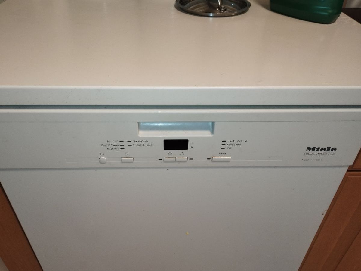 Miele Futura Classic dishwasher control panel with indicator lights