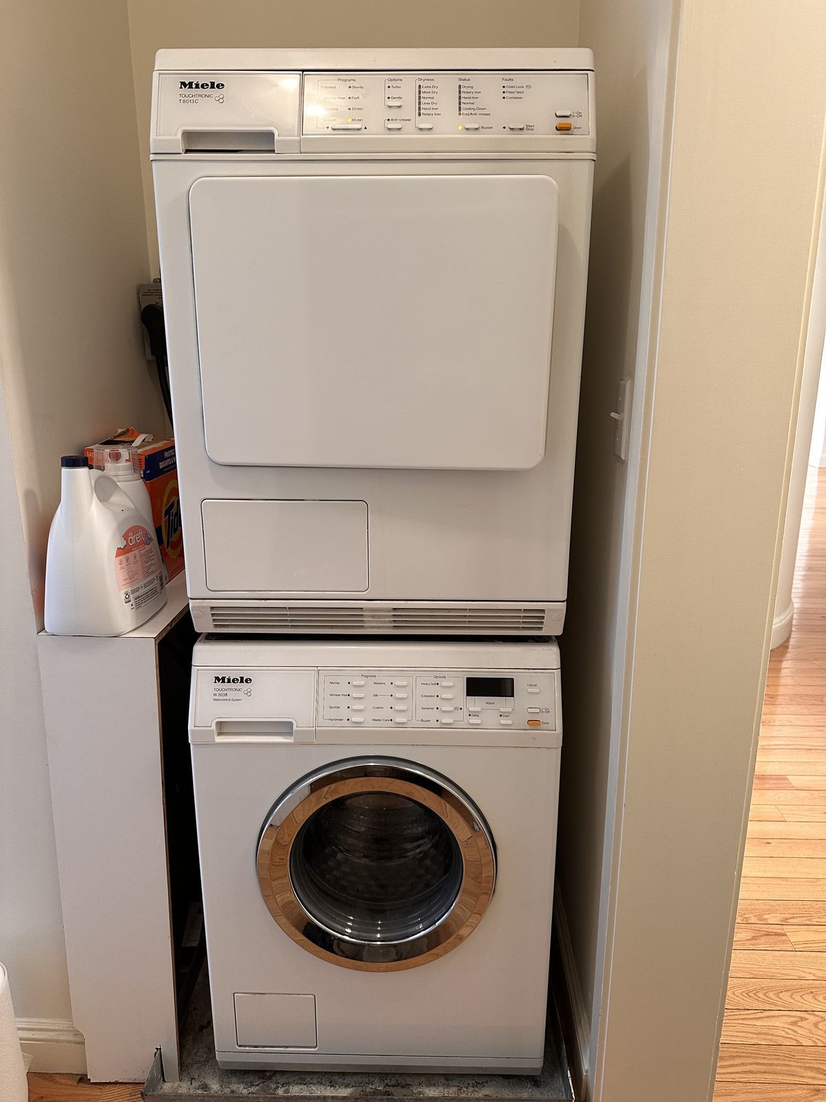 Miele T8013C dryer stacked on a W3038 washer in a NYC apartment