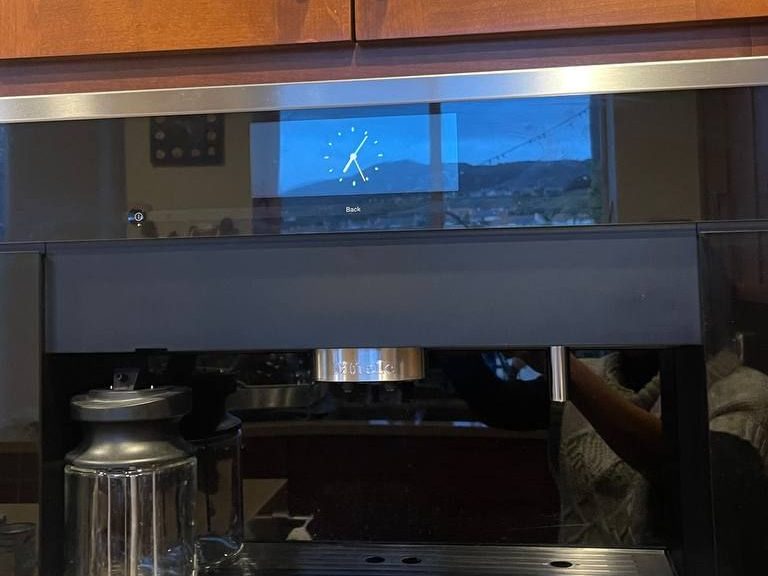 Miele CVA coffee machine brew spout and display up close