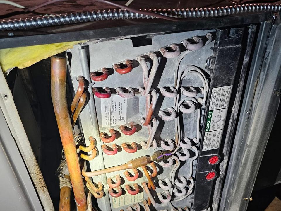 Heat exchanger coil and refrigerant lines opened up during service