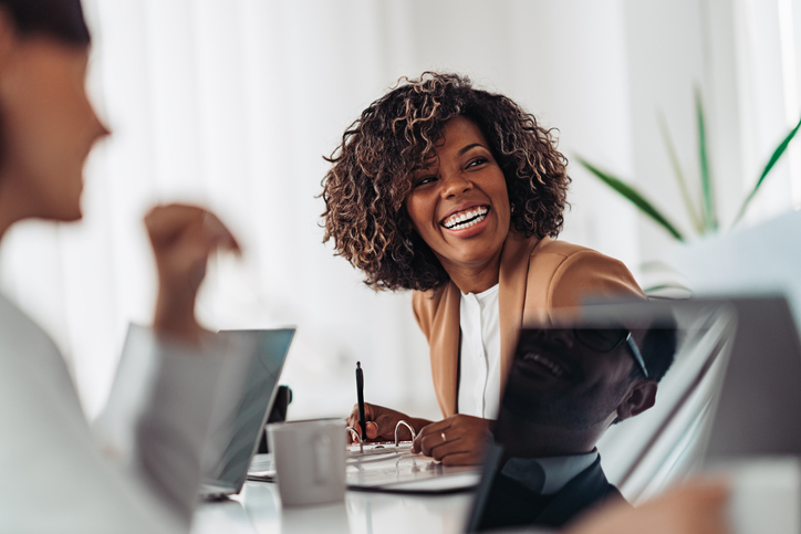 A lady smiling in office
