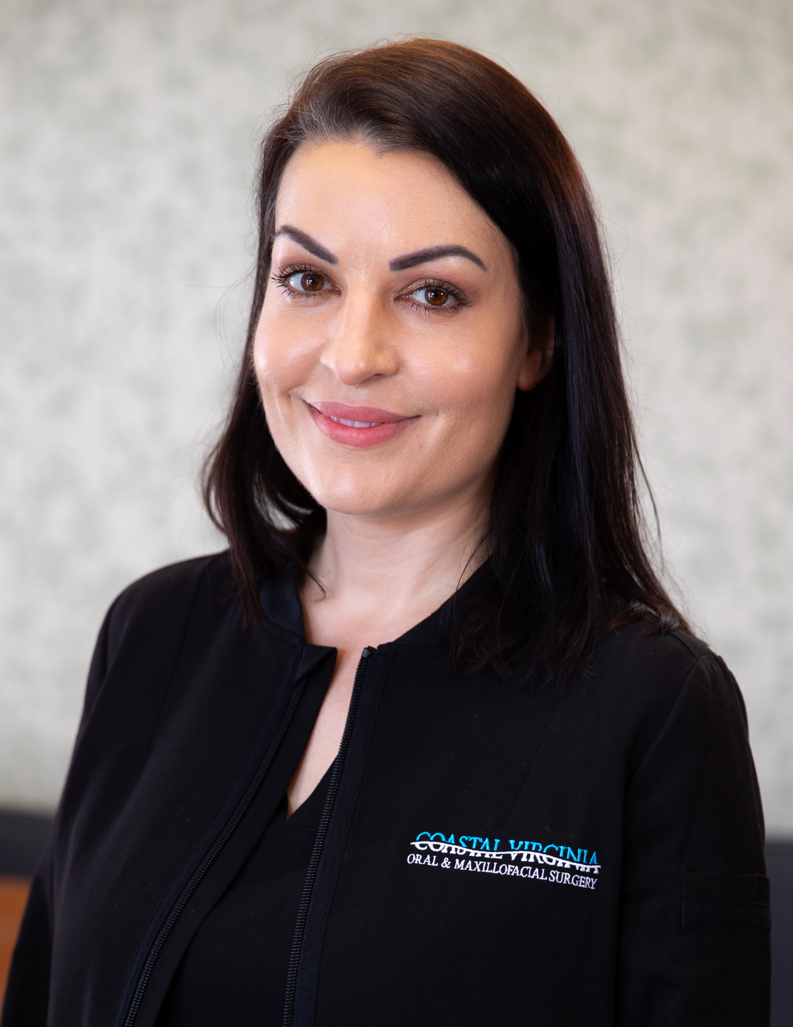 Marissa smiling at Coastal Virginia Oral & Maxillofacial Surgery.