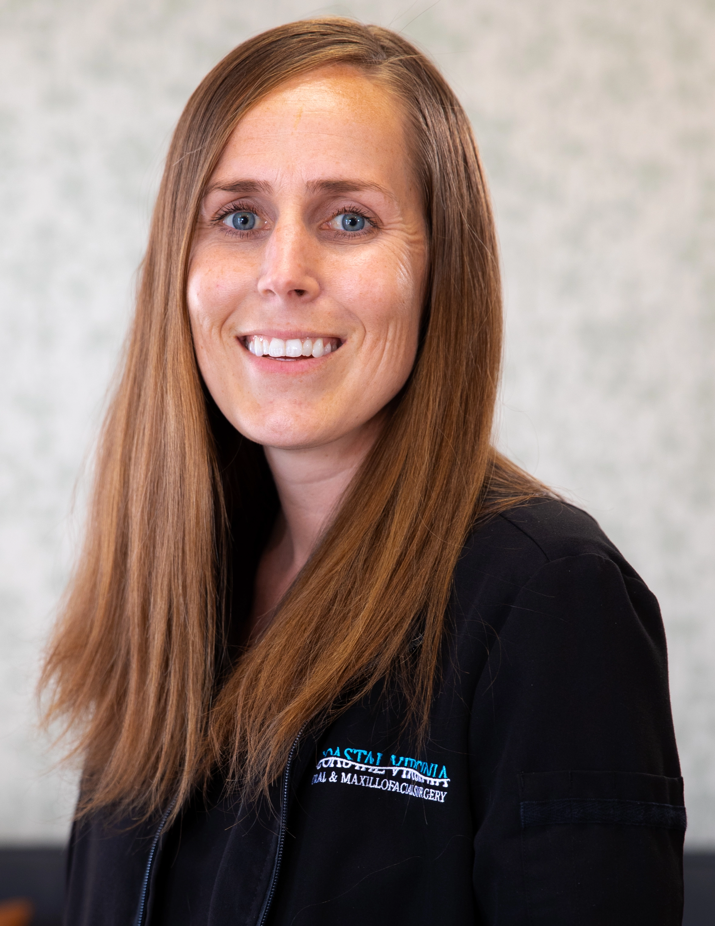 Mallory smiling at Coastal Virginia Oral & Maxillofacial Surgery.