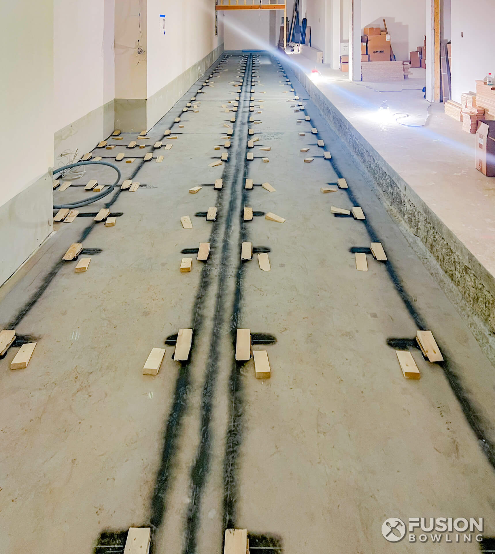 Residential bowling alley installation in MacLean, Virginia with a slab depression.