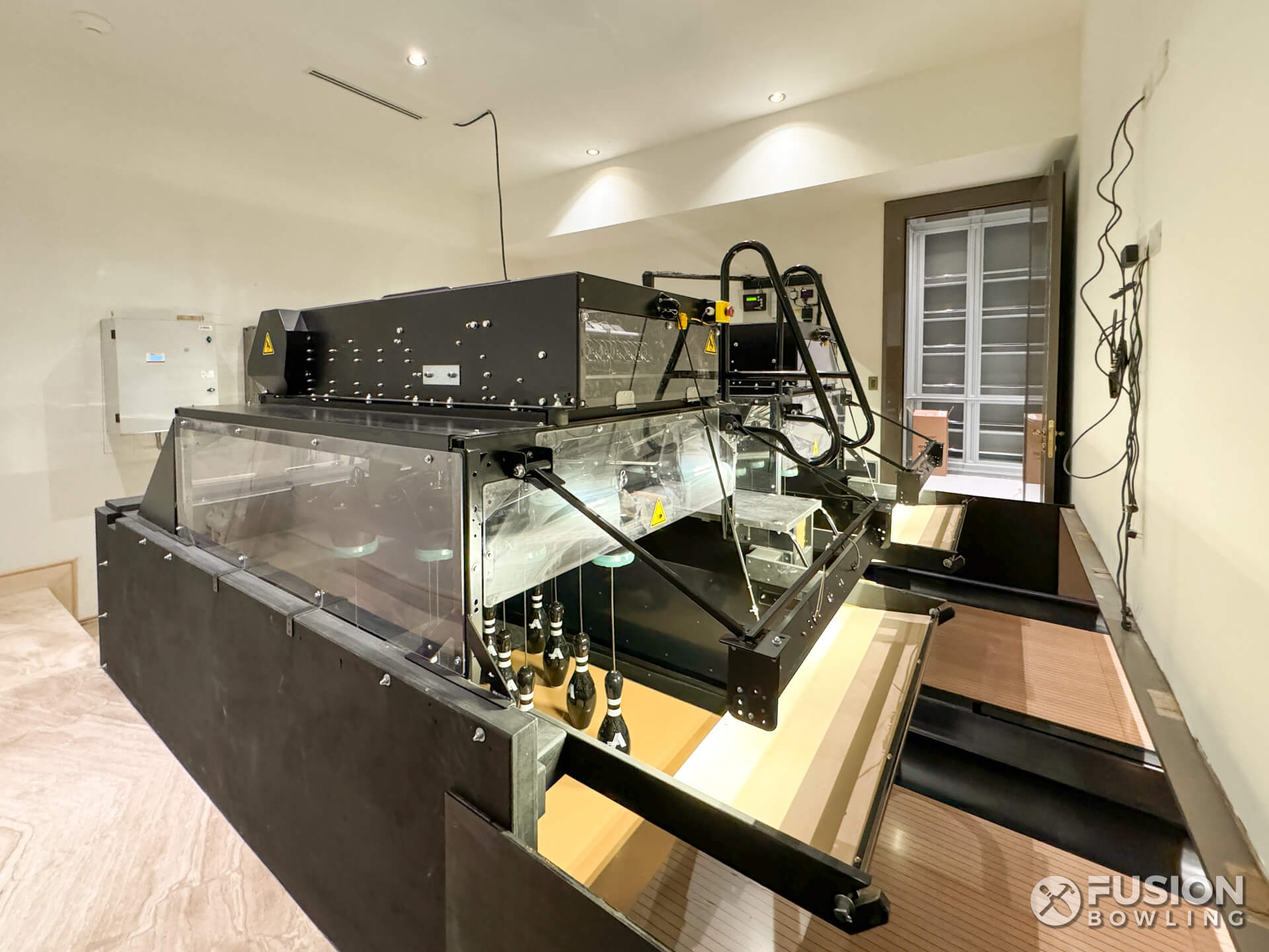 Brunswick string pinsetter machines in a home, installed by Fusion Bowling.
