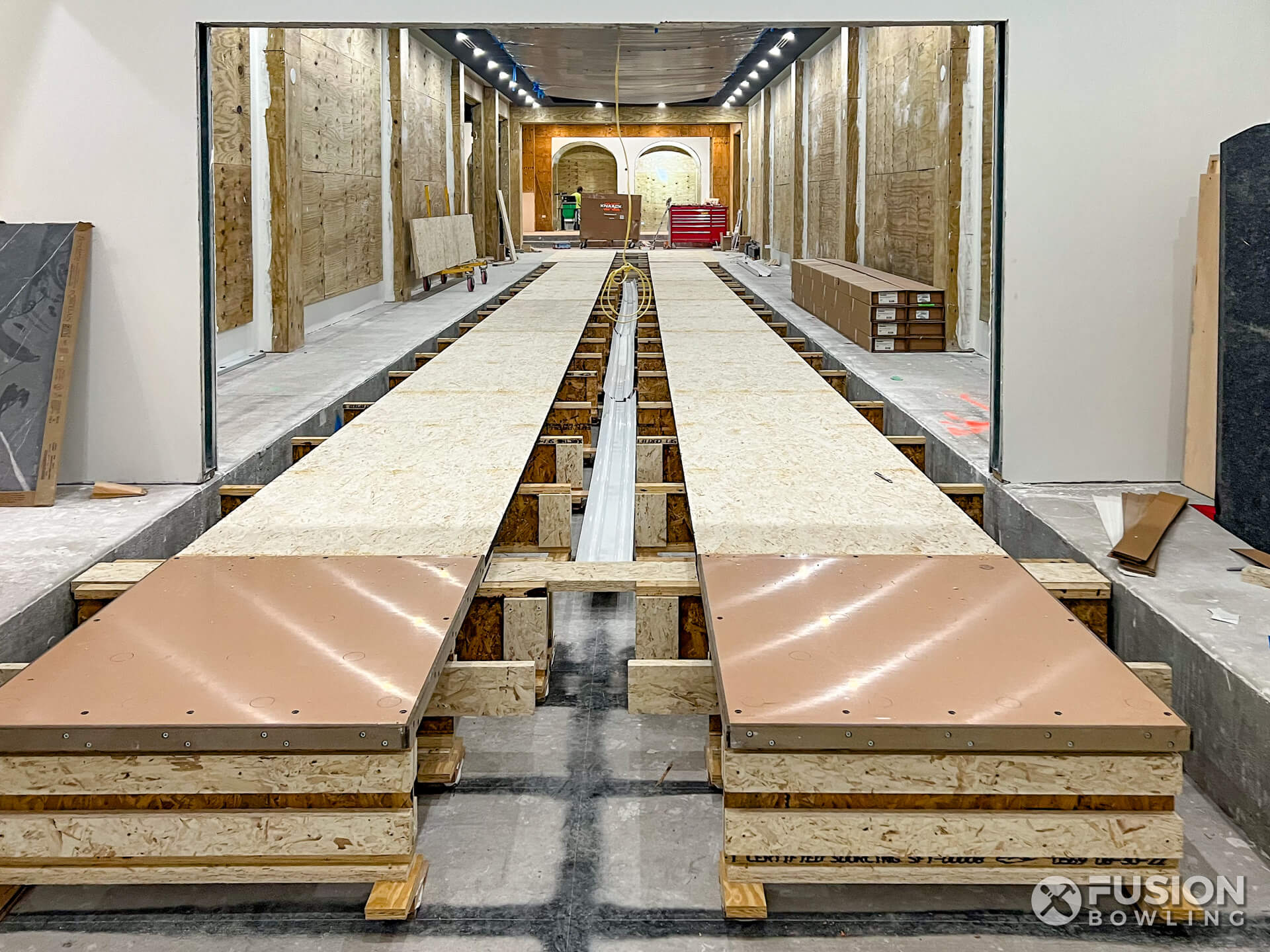 Bowling alley equipment installers built this partially complete bowling alley.