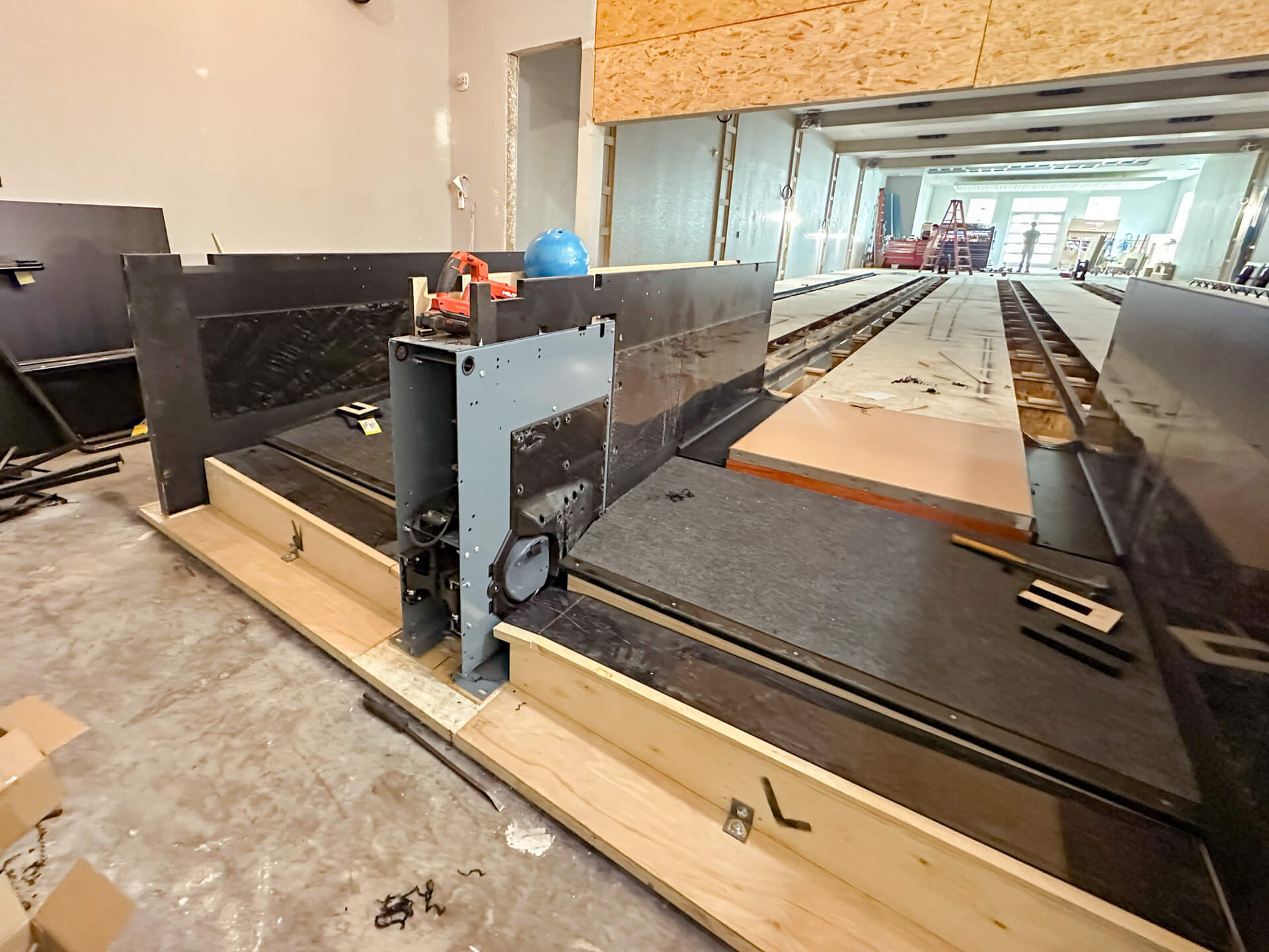 Half-built bowling alley in the pinsetter mechanical room.
