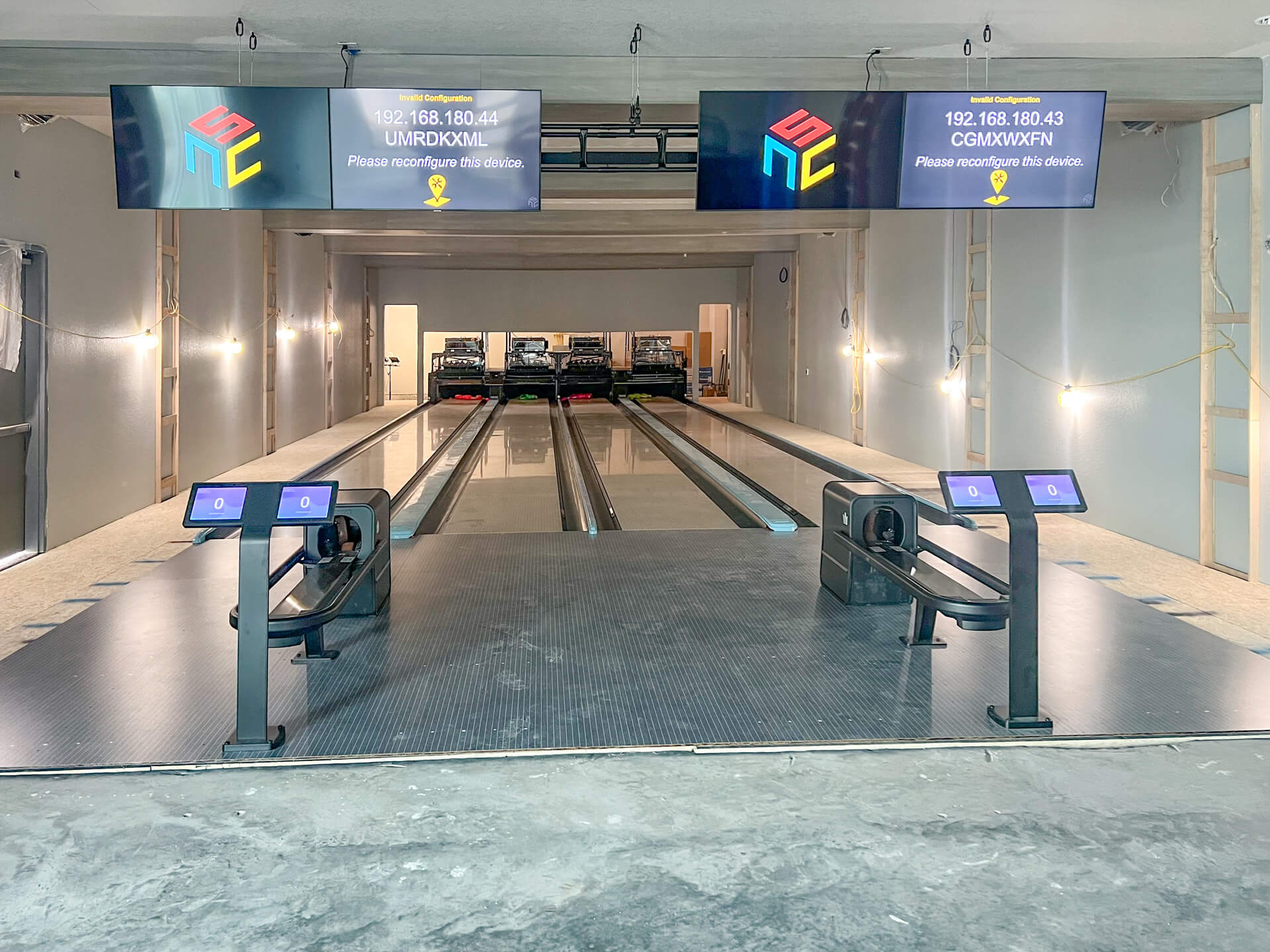 The bowling equipment is installed, but the room is not quite finished.