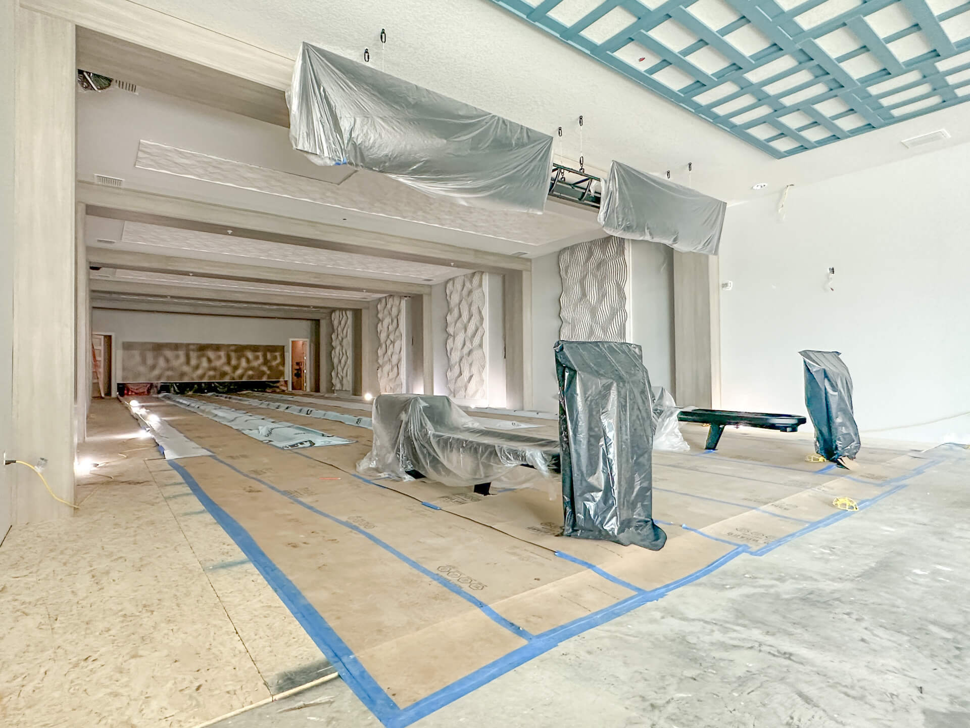 The installed bowling alley equipment has been protected by the builder (general contractor).