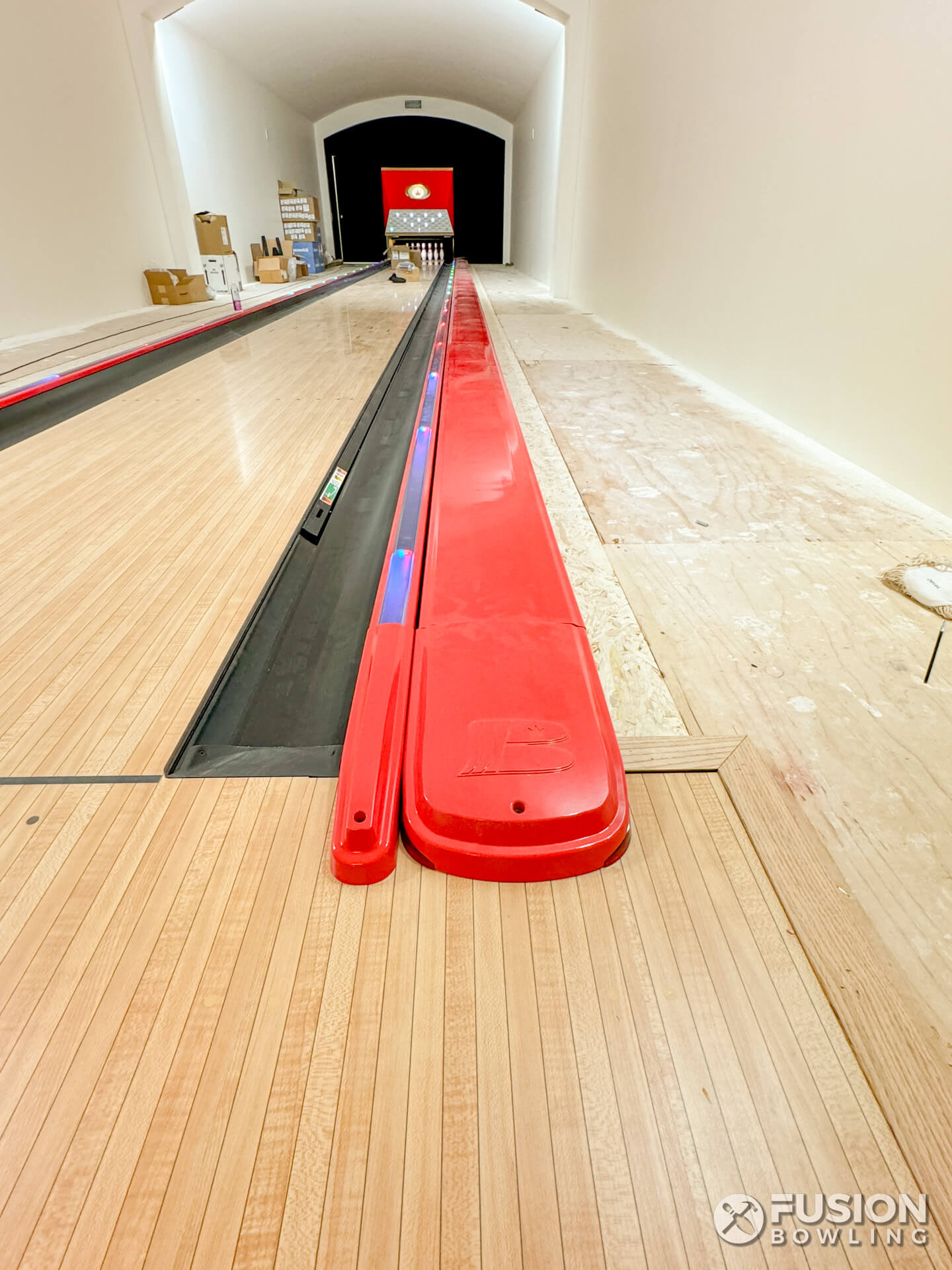 Red bowling lane capping.