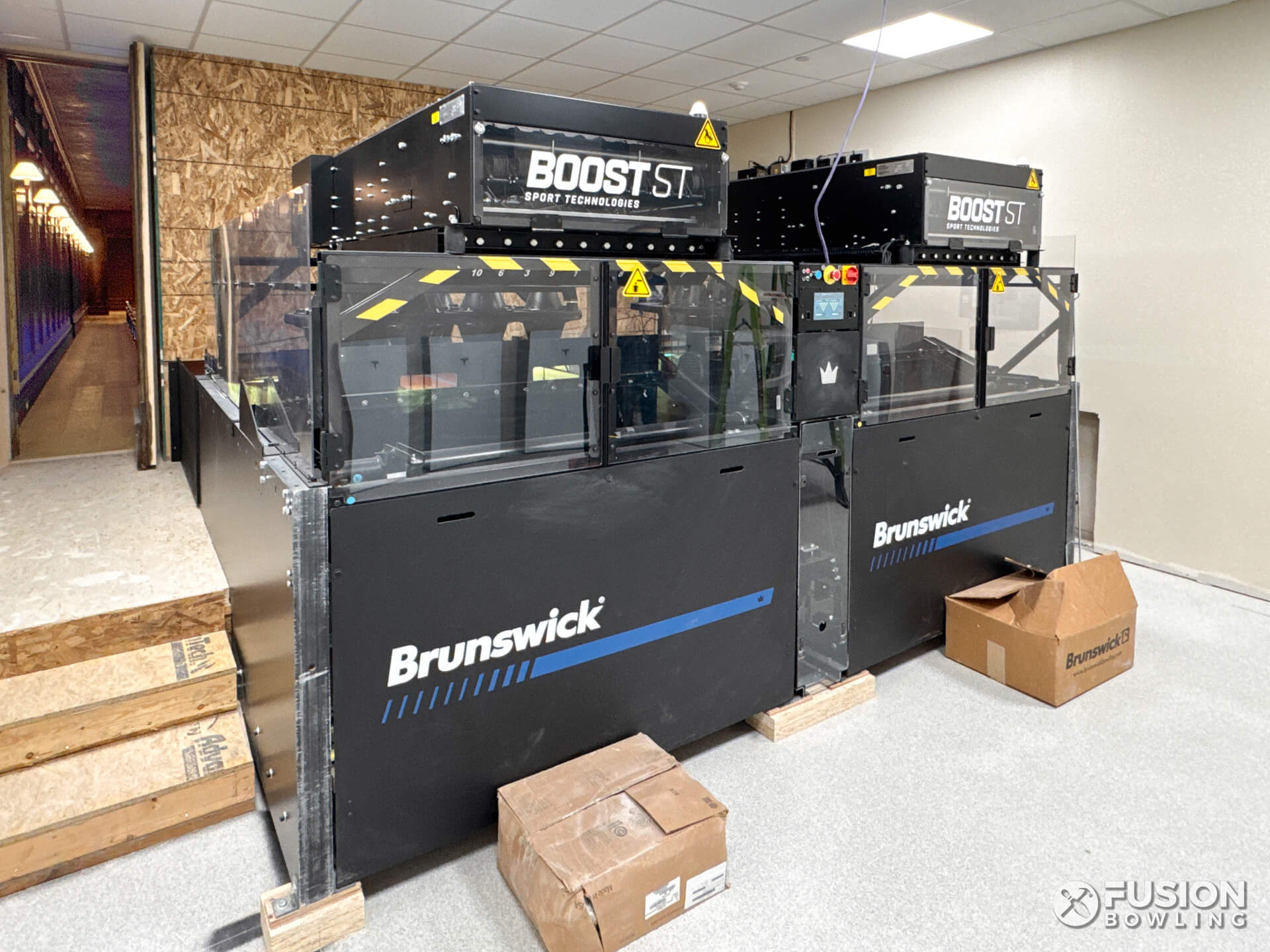 Two Brunswick Boost pinsetter machines.