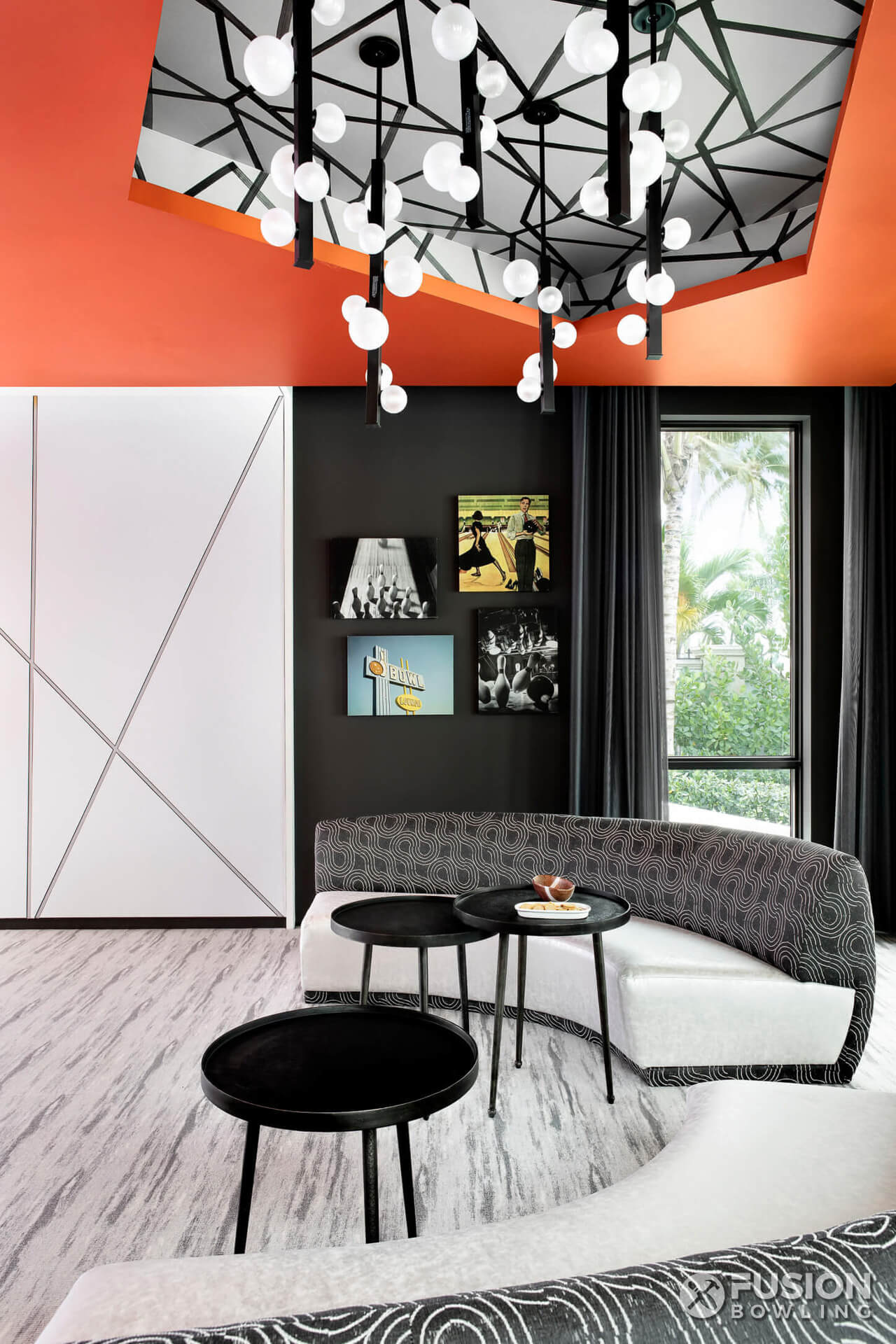 Contemporary chandelier and modern furniture.
