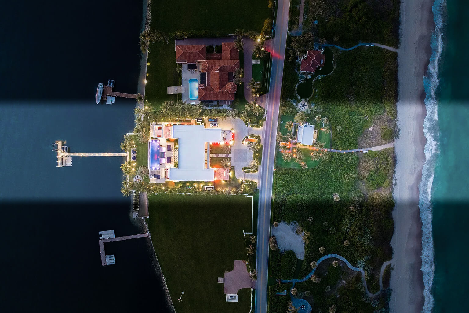 Luxury waterfront mansion is on the ocean and the river.
