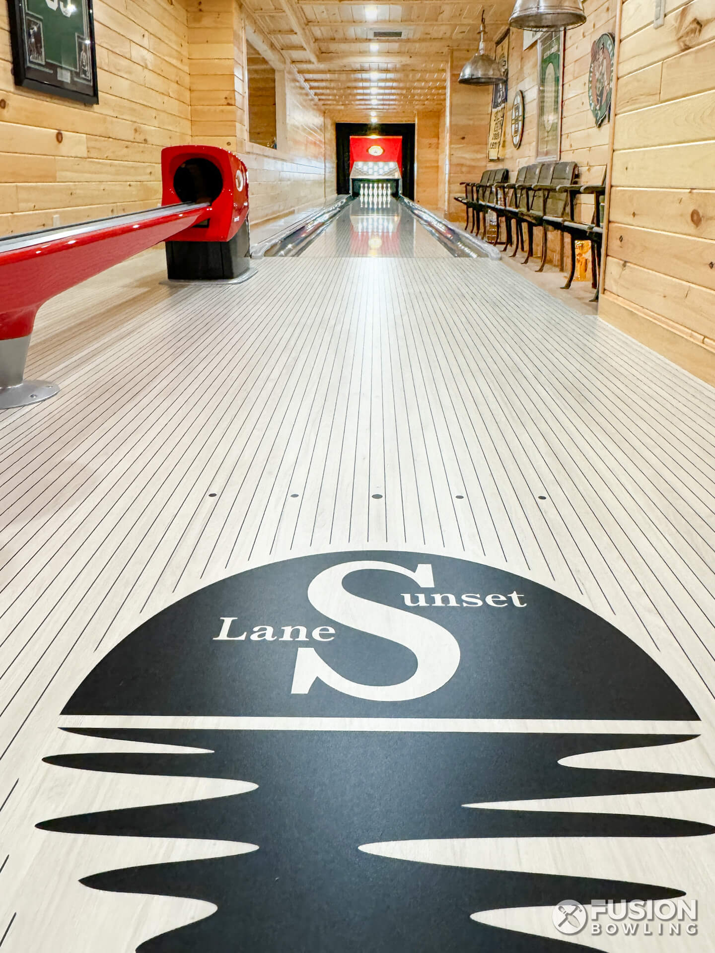 Sunset Lane logo on a home bowing lane approach.