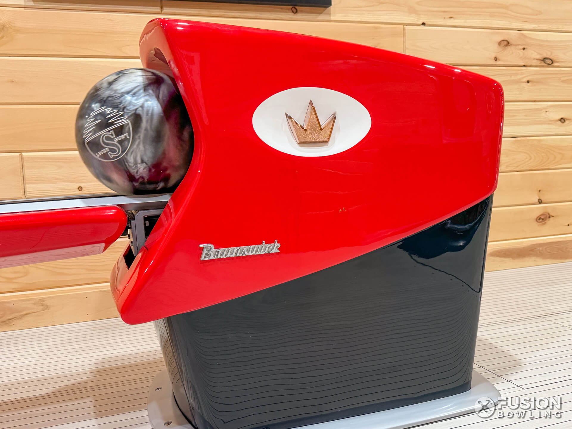 Red restored vintage Brunswick Gold Crown ball return hood.