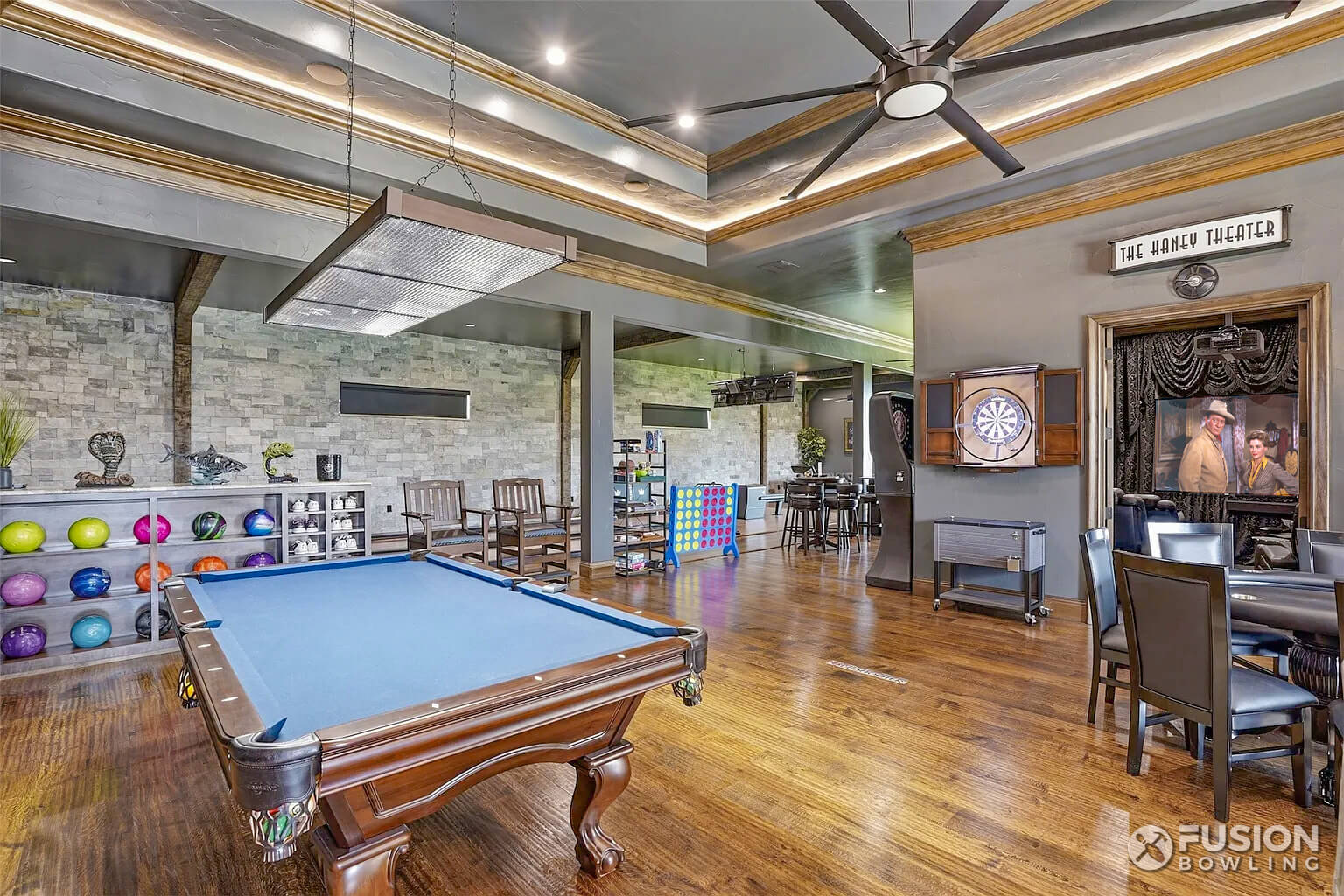 Billiards table and custom bowling ball storage shelving.