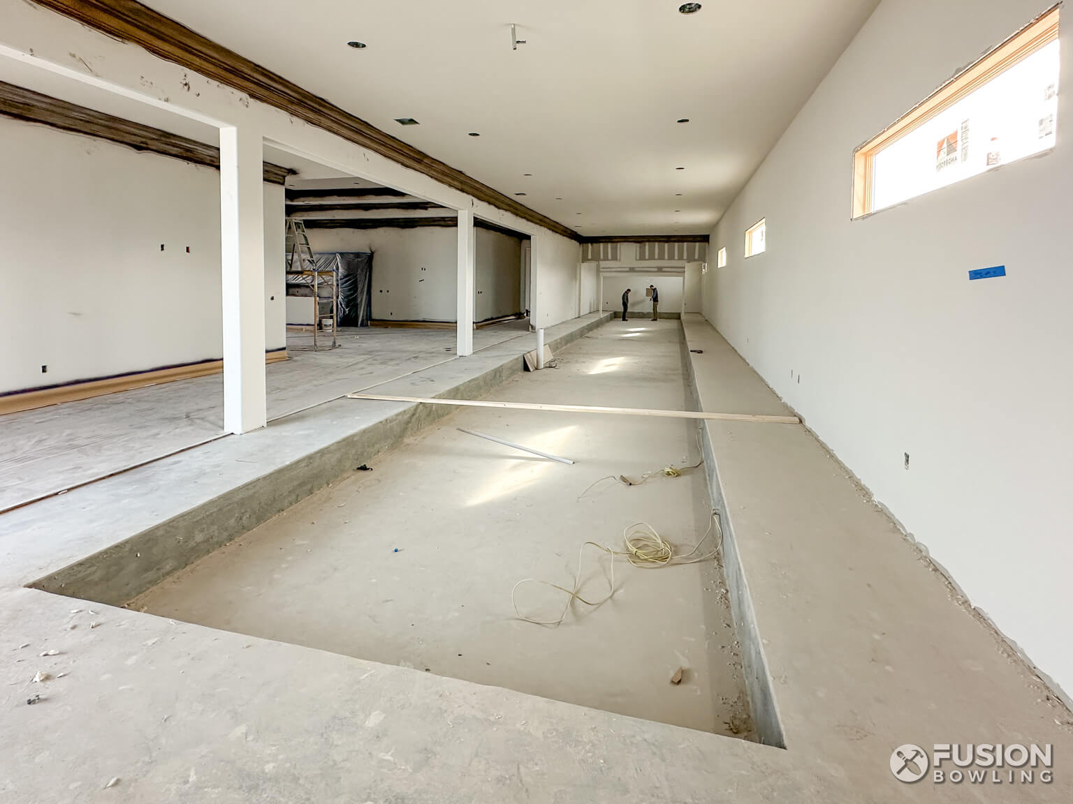 Depressed slab recession for concrete foundation under residential bowling lanes.