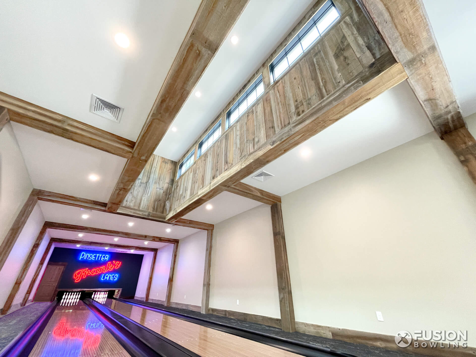 Clerestory architectural feature above a custom bowling alley.