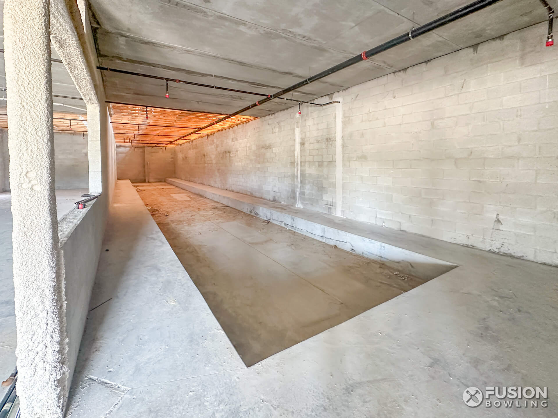 Bowling alley concrete slab recessed.