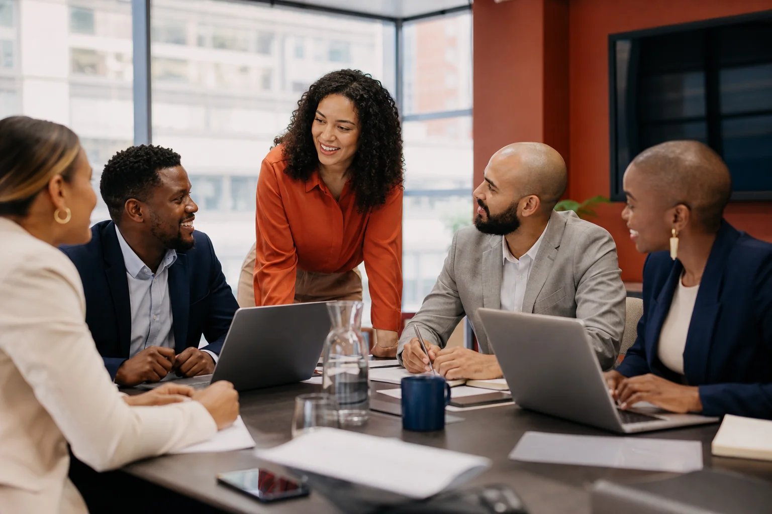 Diverse South African professionals in a modern office collaborating, representing inclusive workforce and BBBEE context. Photorealistic photograph of a diverse group of South African professionals of different ethnicities collaborating