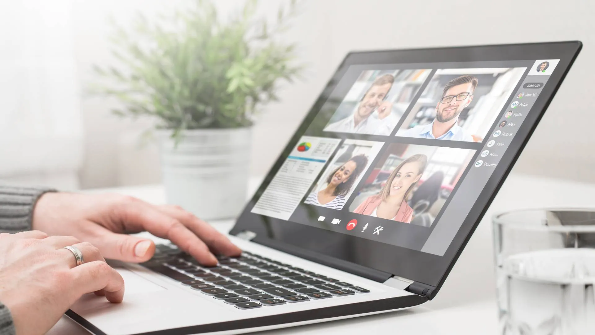 We are looking at someones laptop screen where there is a team meeting happening.