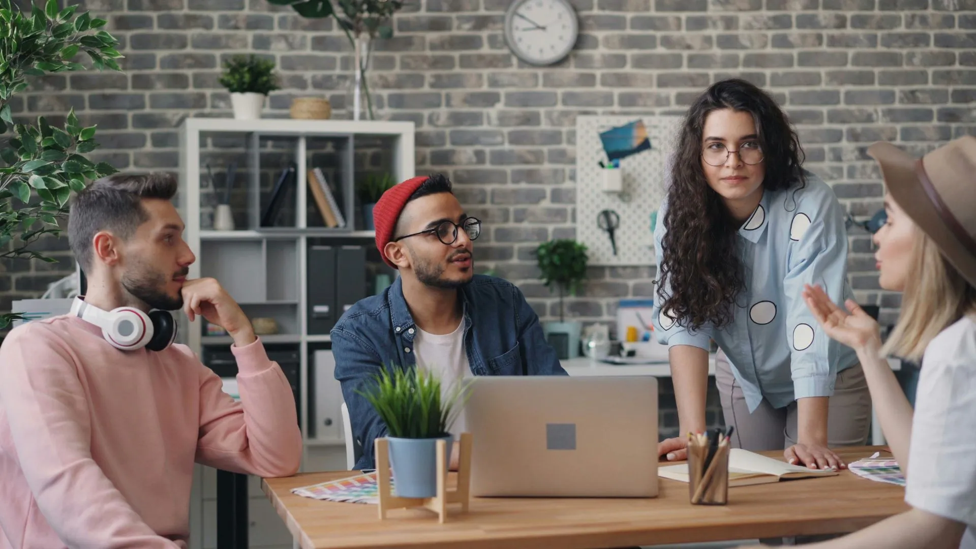 A team is working together on a project in an office.