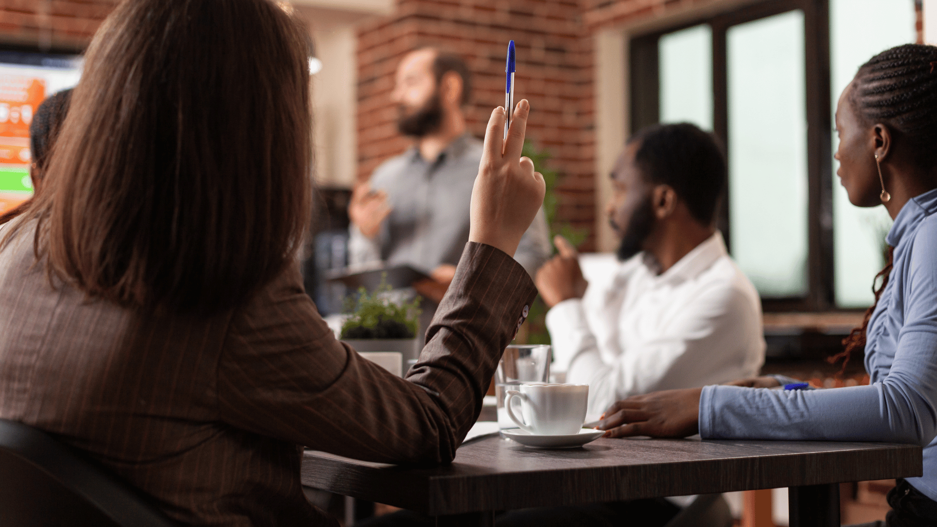 A team in a conference room working together.