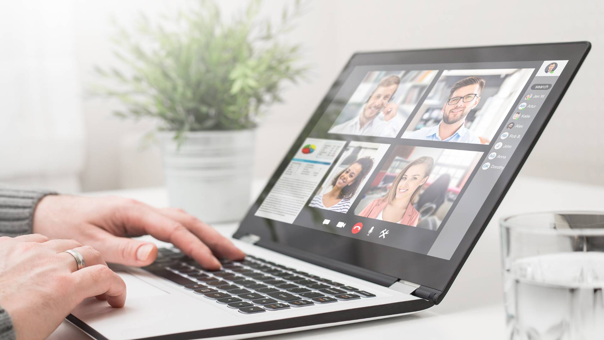 We are looking at someones laptop screen where there is a team meeting happening.